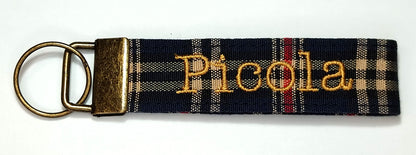 Llavero con anilla color bronce personalizable en estampado y nombre.