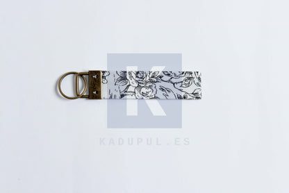 Llavero con anilla color bronce, estampado a elegir.